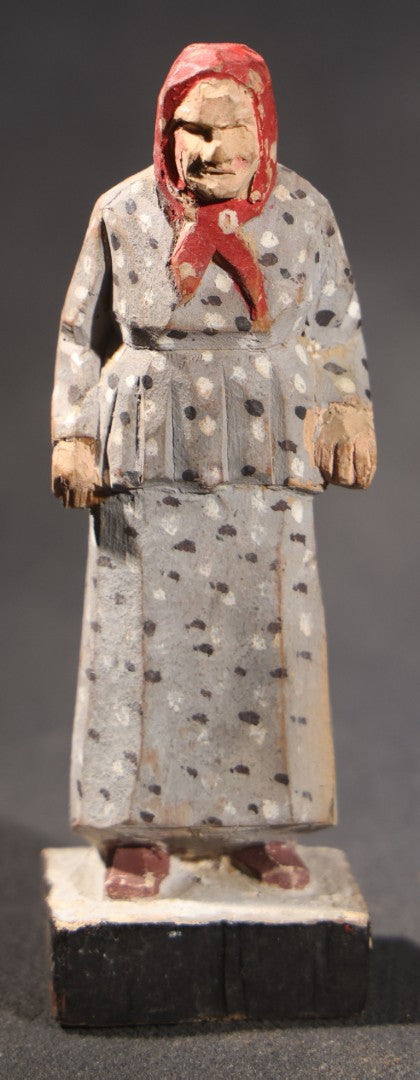 Lot 034 - Grouping Of Eight Vintage Folk Art Hand-Carved And Painted Wooden Figures In Traditional Dress