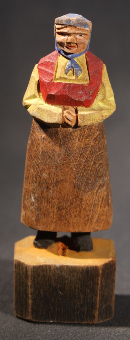 Lot 034 - Grouping Of Eight Vintage Folk Art Hand-Carved And Painted Wooden Figures In Traditional Dress