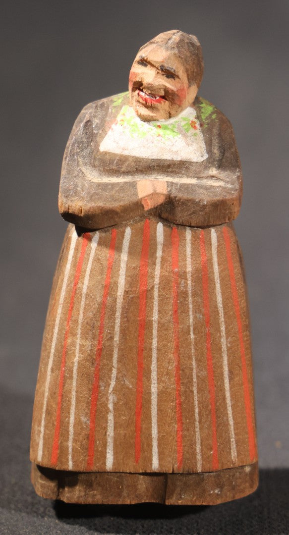 Lot 034 - Grouping Of Eight Vintage Folk Art Hand-Carved And Painted Wooden Figures In Traditional Dress
