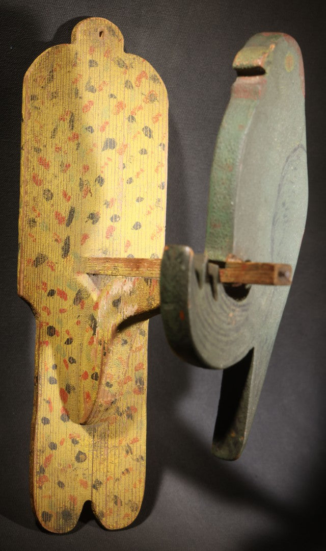 Lot 035 - Antique Folk Art Painted Green Scroll-Cut Wooden Wall-Mounted Parrot On Yellow Spatter-Painted Backboard