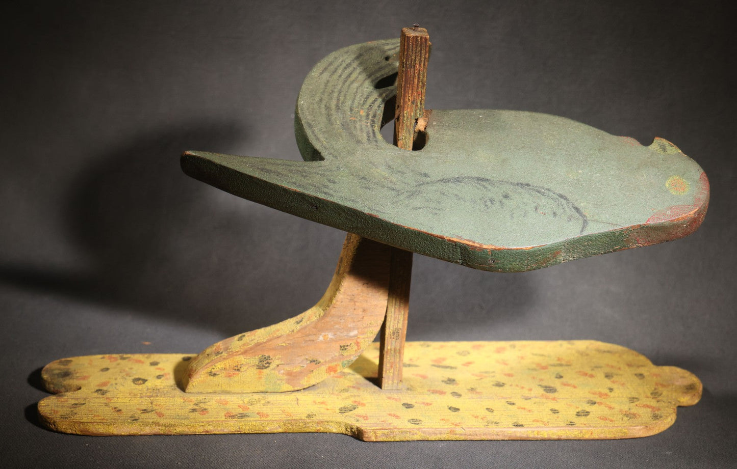Lot 035 - Antique Folk Art Painted Green Scroll-Cut Wooden Wall-Mounted Parrot On Yellow Spatter-Painted Backboard