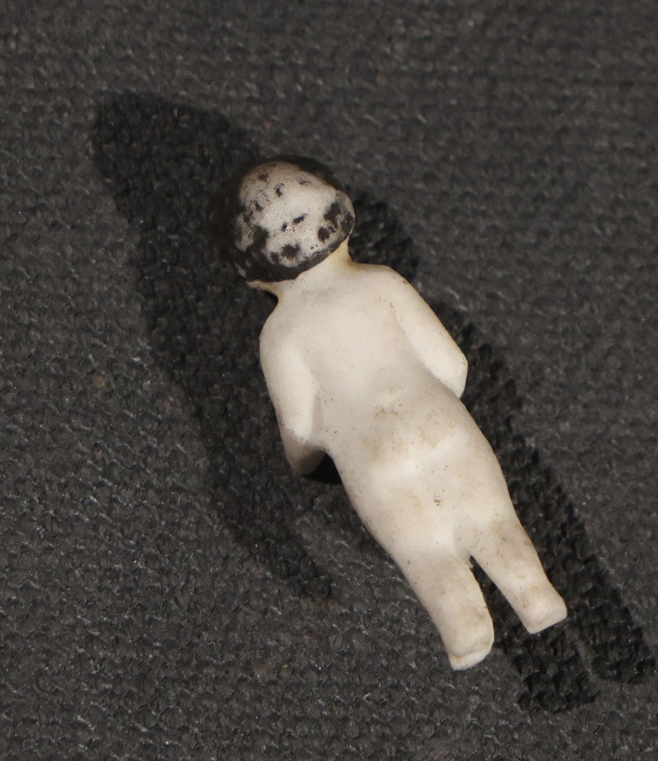 Lot 045 - Pair Of Antique Miniature Frozen Charlotte Dolls, One Porcelain In Cloth Gown And One Bisque