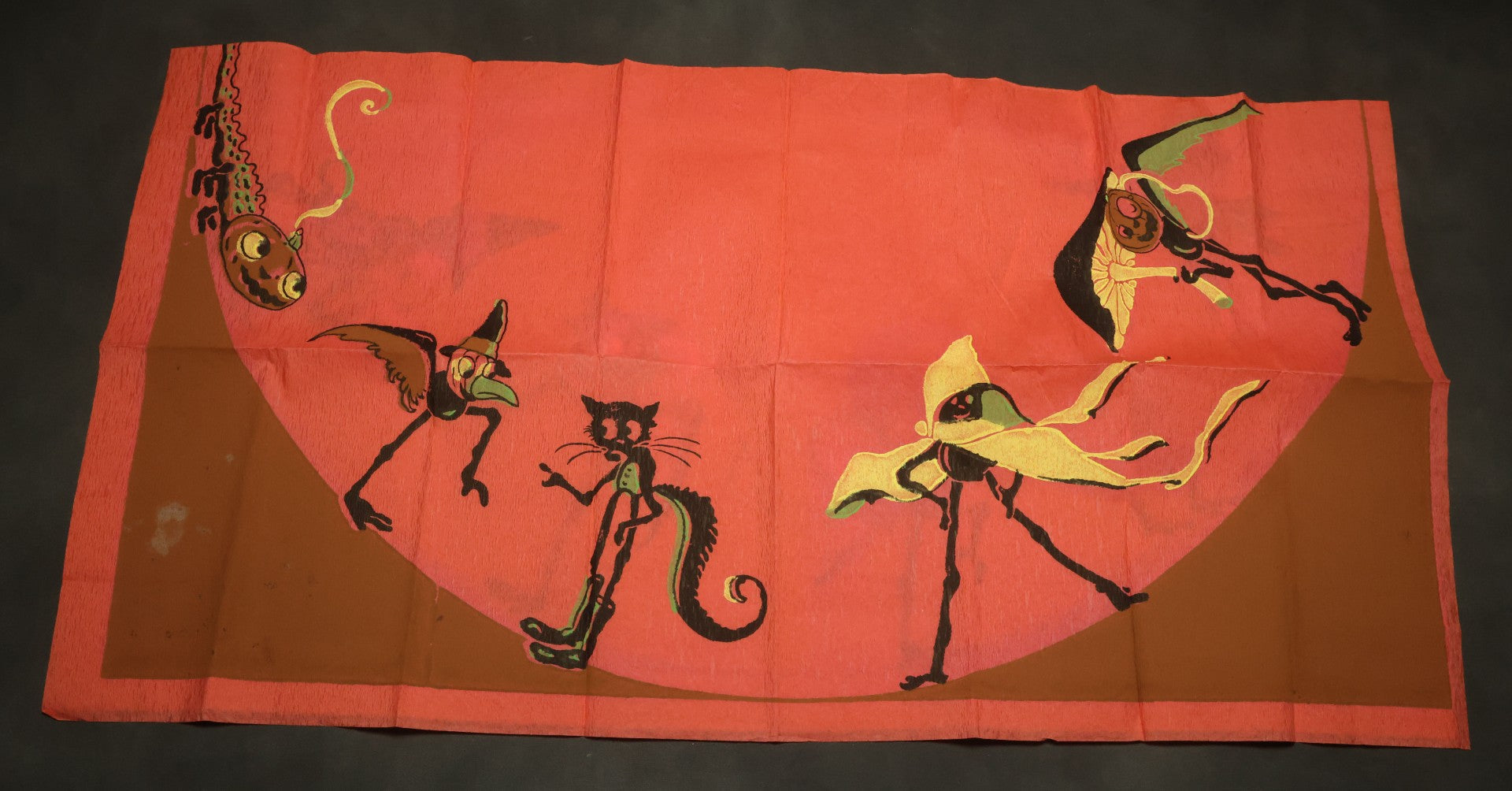 Lot 046 - Antique Dennison's Halloween Crepe Paper Table Cover No. H377 With Black Cat, Witch, Owl, Moon, And J.O.L. Graphics, In Original Envelope, Dennison Manufacturing Co., Framingham, Massachusetts
