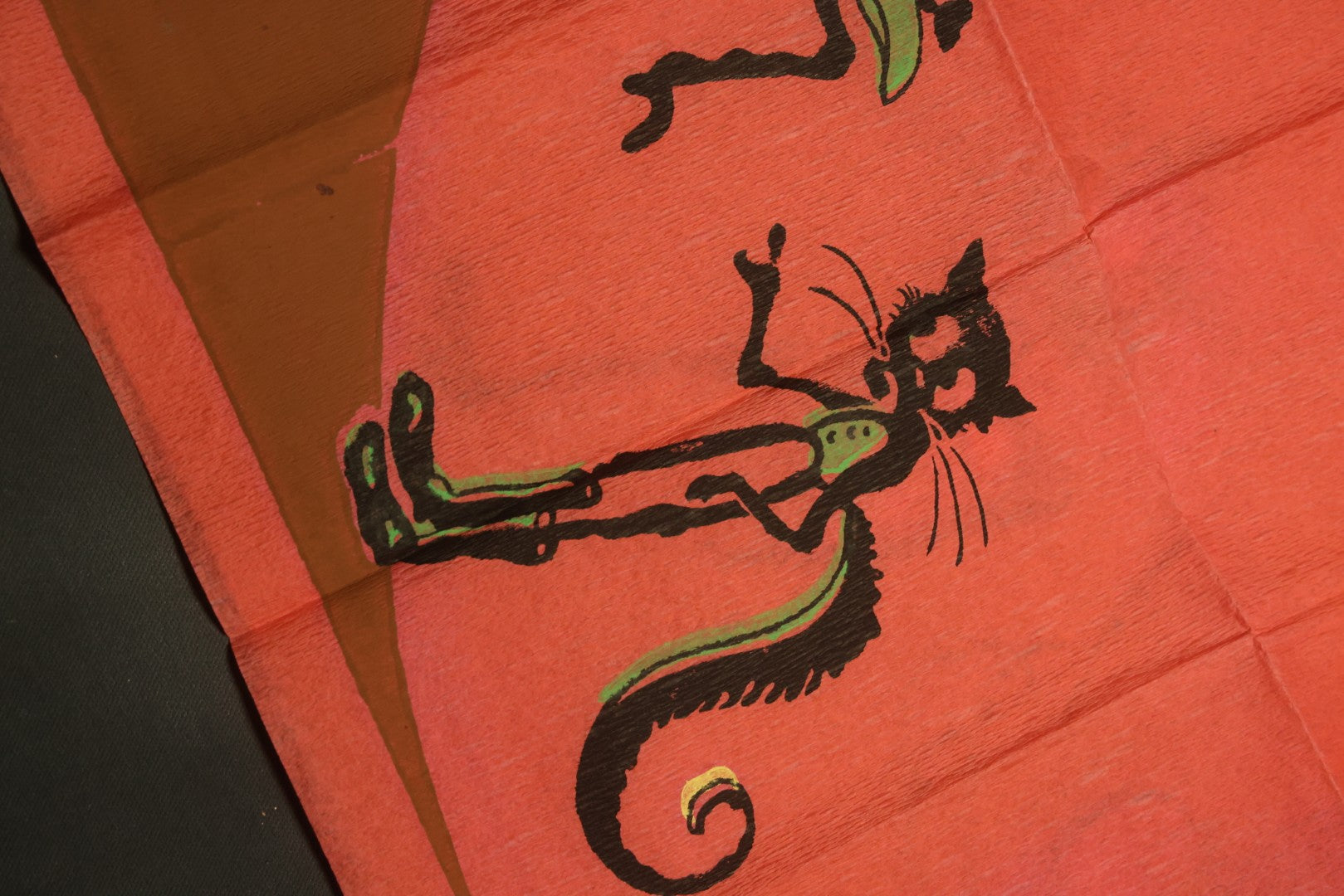 Lot 046 - Antique Dennison's Halloween Crepe Paper Table Cover No. H377 With Black Cat, Witch, Owl, Moon, And J.O.L. Graphics, In Original Envelope, Dennison Manufacturing Co., Framingham, Massachusetts