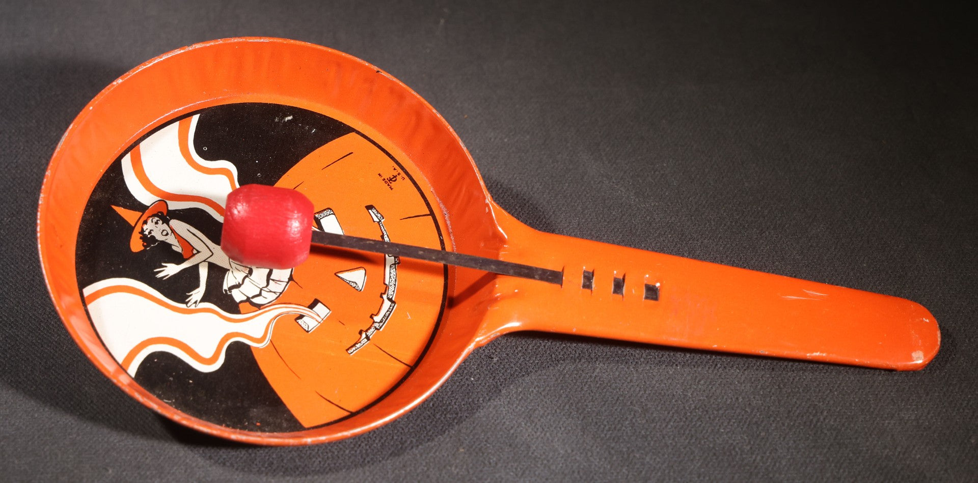 Lot 049 - Pair Of Vintage Halloween Tin Lithograph Paddle Noisemakers, T. Cohn Inc. Jack-O-Lantern J.O.L. And Witch Woman, And U.S. Metal Toy Mfg. Co. Witch, Ghost, Black Cat, And Haunted House