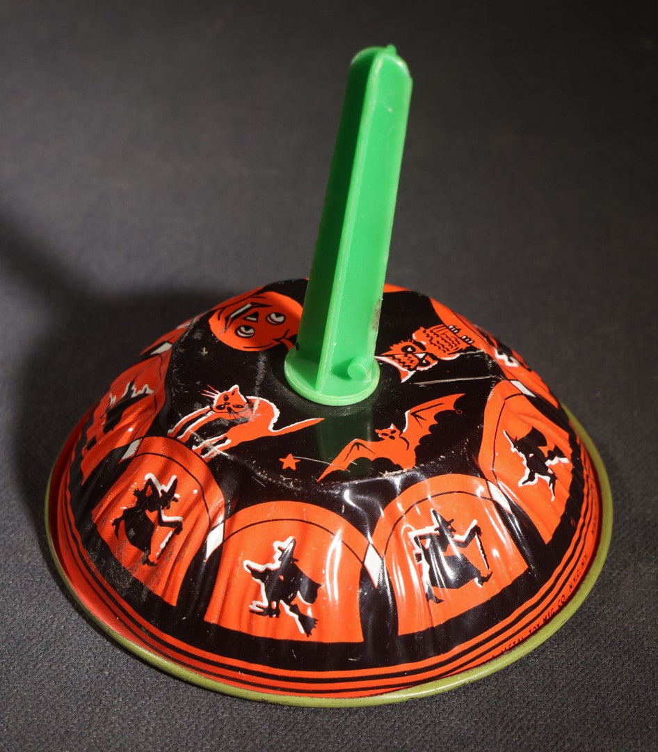 Lot 050 - Trio Of Vintage Halloween Tin Lithograph Noisemakers, U.S. Metal Toy Mfg. Co., With Witch, Bat, Jack-O-Lantern, And Cat Graphics, Bell Rattle, And Clapper Examples