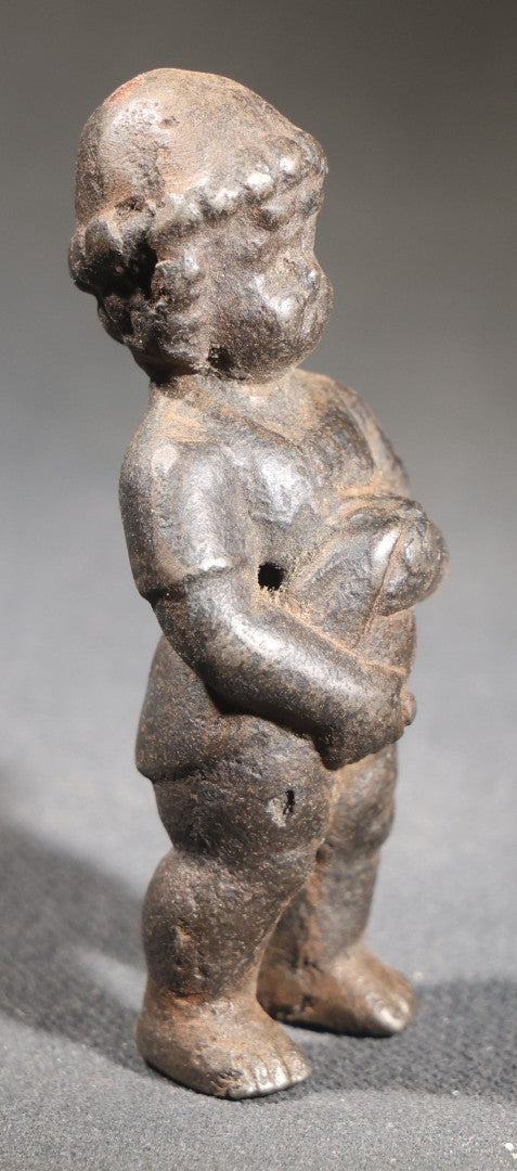 Lot 053 - Antique Cast Iron Manneken Pis-Style Figural Statuette, Standing Peeing Male Child, Dark Patina, 2-7/8" H