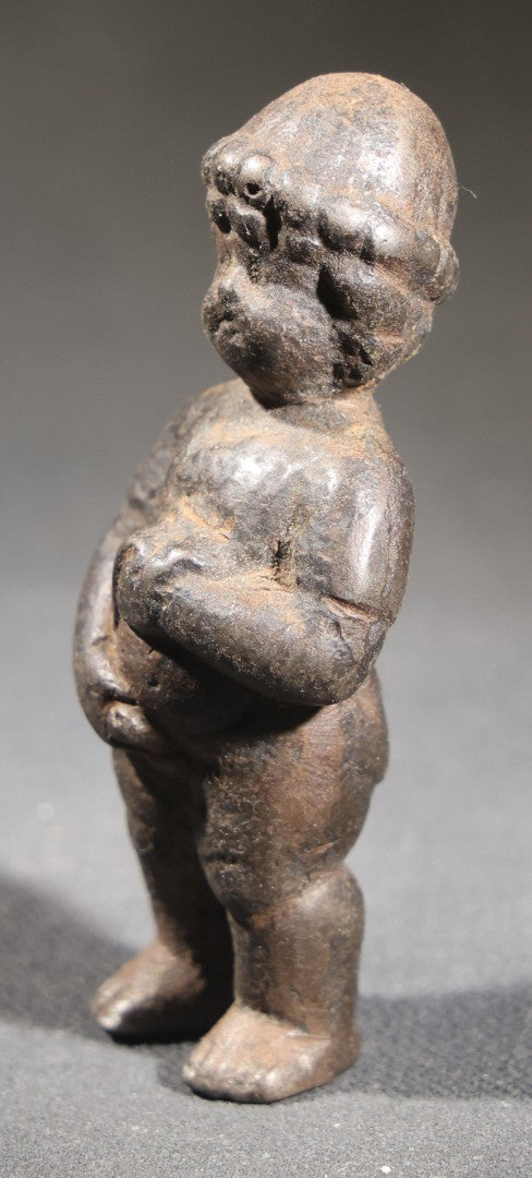 Lot 053 - Antique Cast Iron Manneken Pis-Style Figural Statuette, Standing Peeing Male Child, Dark Patina, 2-7/8" H