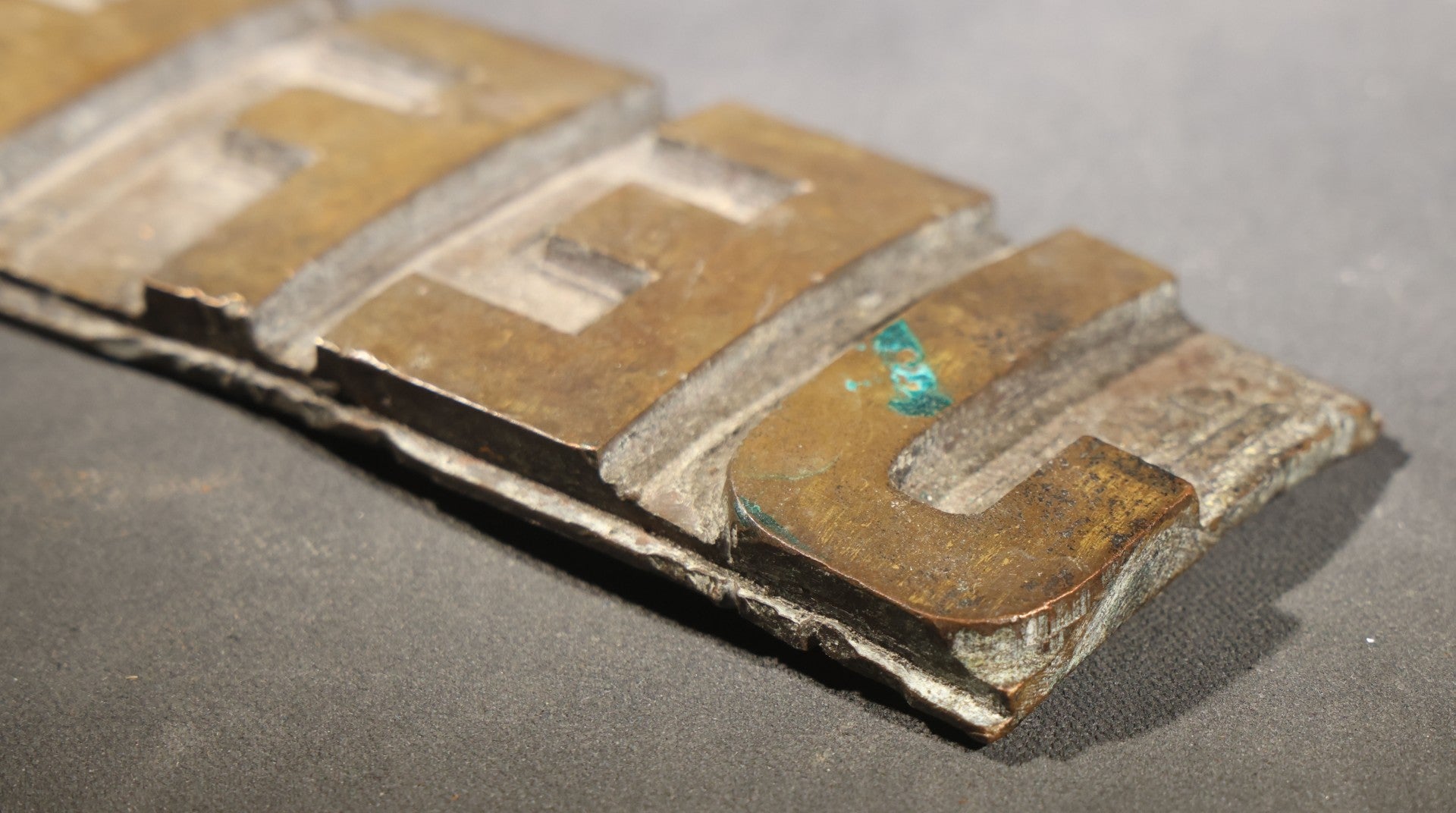 Lot 057 - Antique Bronze Printing Plate, "Jefferson" In Relief Block Letters, Milled Surface, Bowed, 16-1/4" L