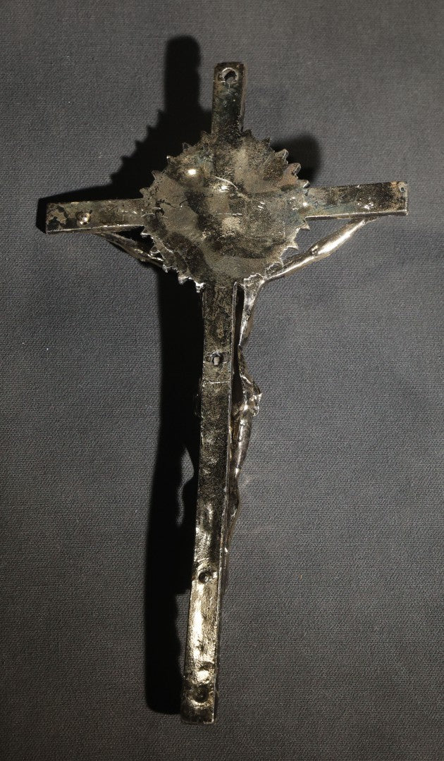 Lot 063 - Pair Of Vintage Metal Crucifixes, One Silver-Toned With Foliate Halo And One Gold-Toned With Red Cabochons And Enamel Inlay