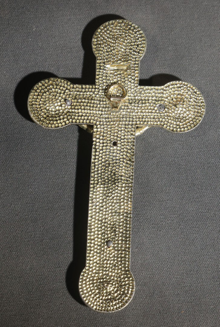Lot 063 - Pair Of Vintage Metal Crucifixes, One Silver-Toned With Foliate Halo And One Gold-Toned With Red Cabochons And Enamel Inlay