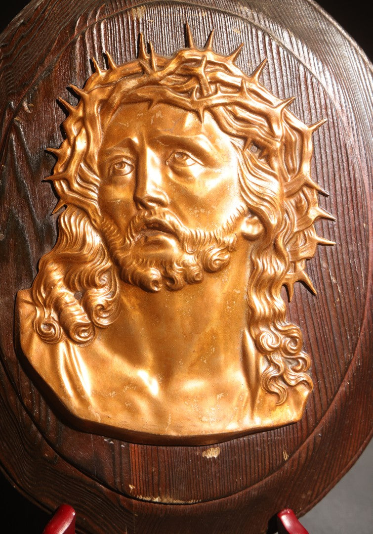 Lot 070 - Vintage Oval Wood Plaque With Gold-Toned Metal Relief Bust Of Christ Wearing Crown Of Thorns