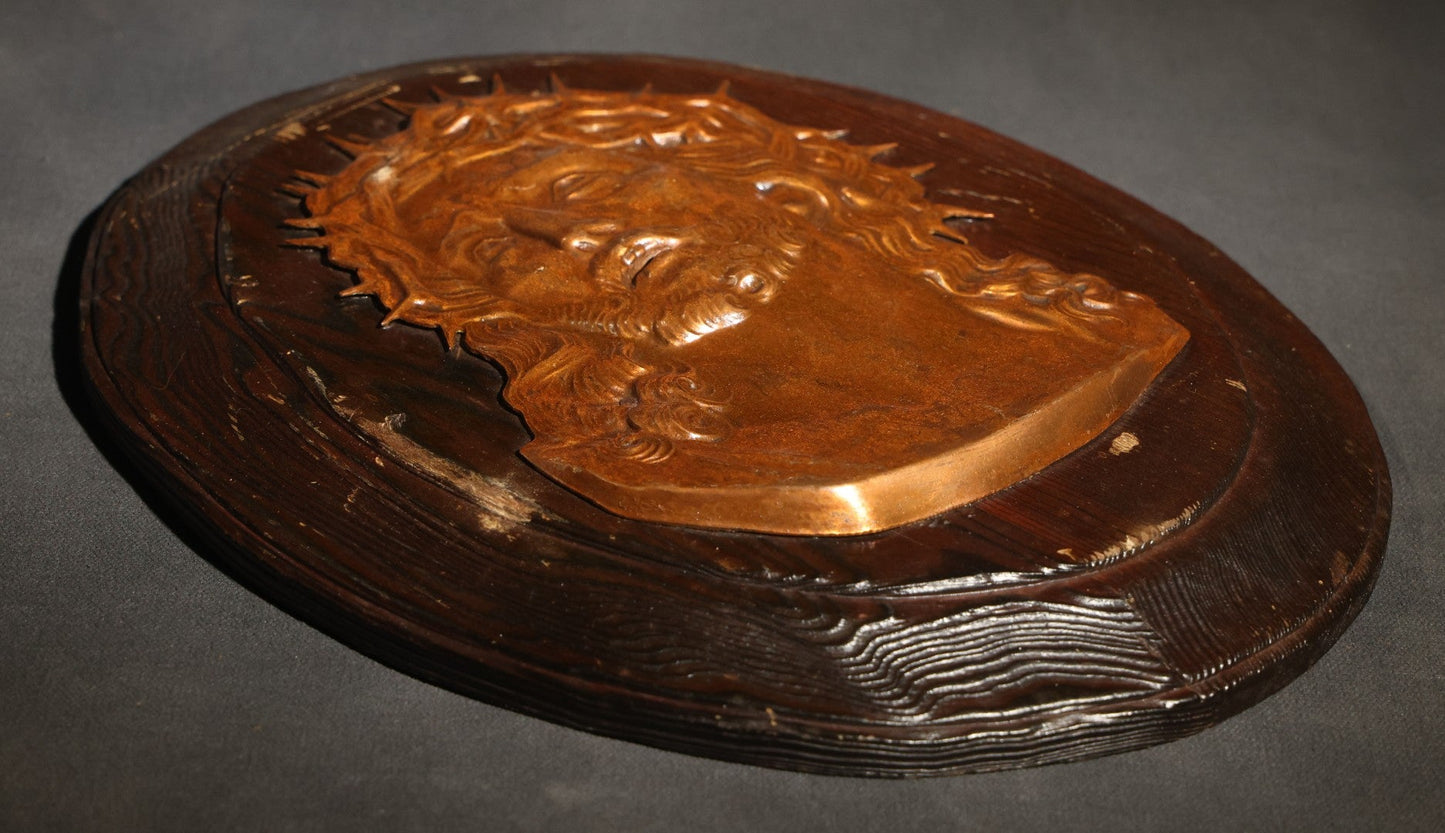 Lot 070 - Vintage Oval Wood Plaque With Gold-Toned Metal Relief Bust Of Christ Wearing Crown Of Thorns