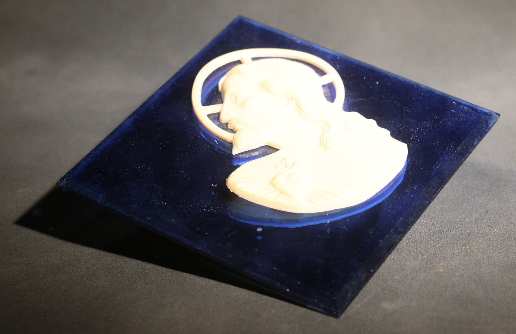Lot 072 - Vintage Cobalt Blue Glass Wall Plaque With Relief Bust Of Christ, Sacred Heart And Cruciform Halo