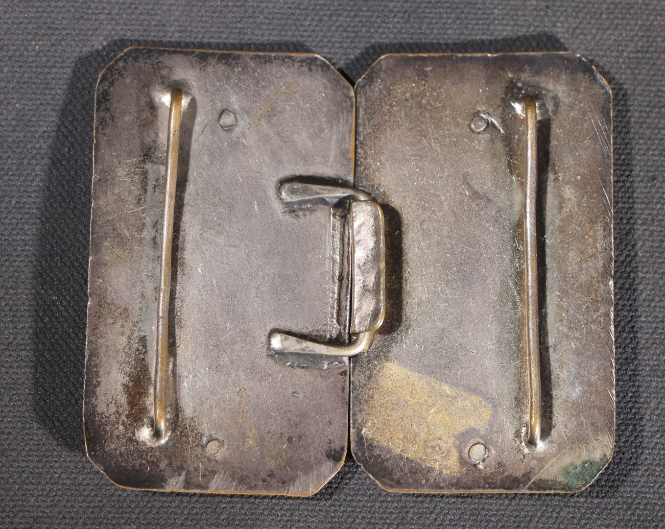 Lot 081 - Antique Silver-Plated Two-Piece Belt Buckle With Embossed Figural Woman Carrying Water Jug In Garden Setting