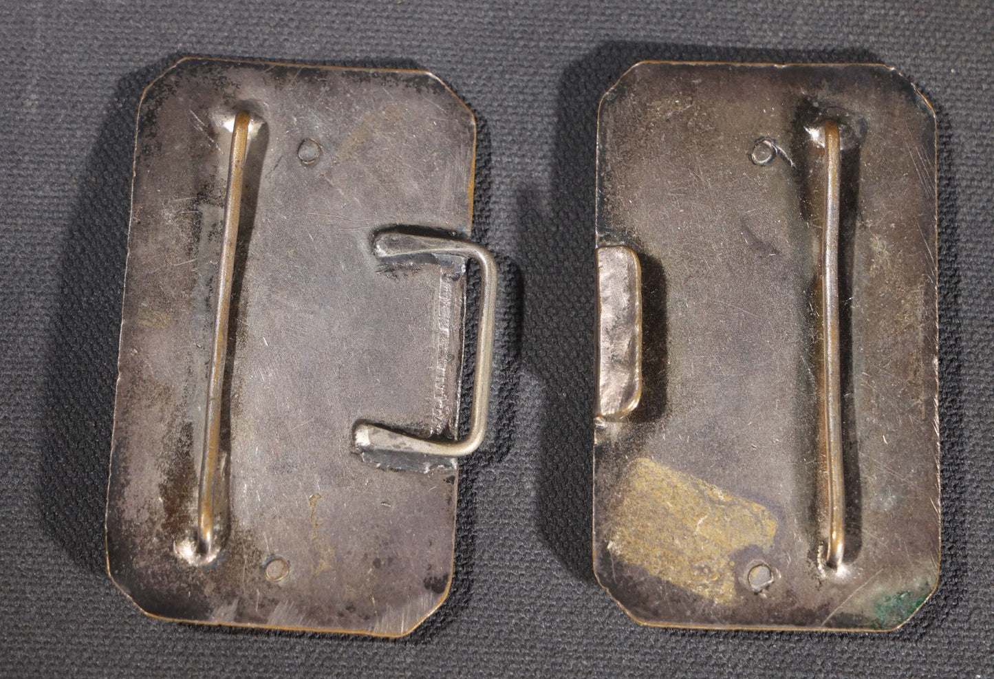 Lot 081 - Antique Silver-Plated Two-Piece Belt Buckle With Embossed Figural Woman Carrying Water Jug In Garden Setting