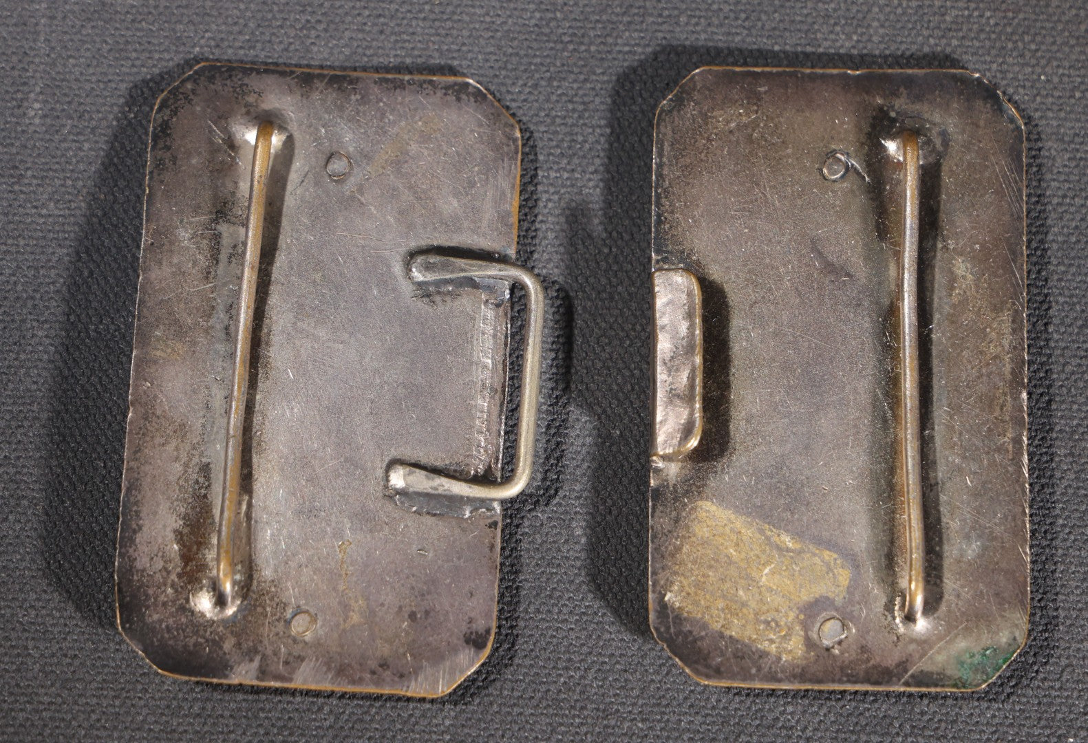 Lot 081 - Antique Silver-Plated Two-Piece Belt Buckle With Embossed Figural Woman Carrying Water Jug In Garden Setting