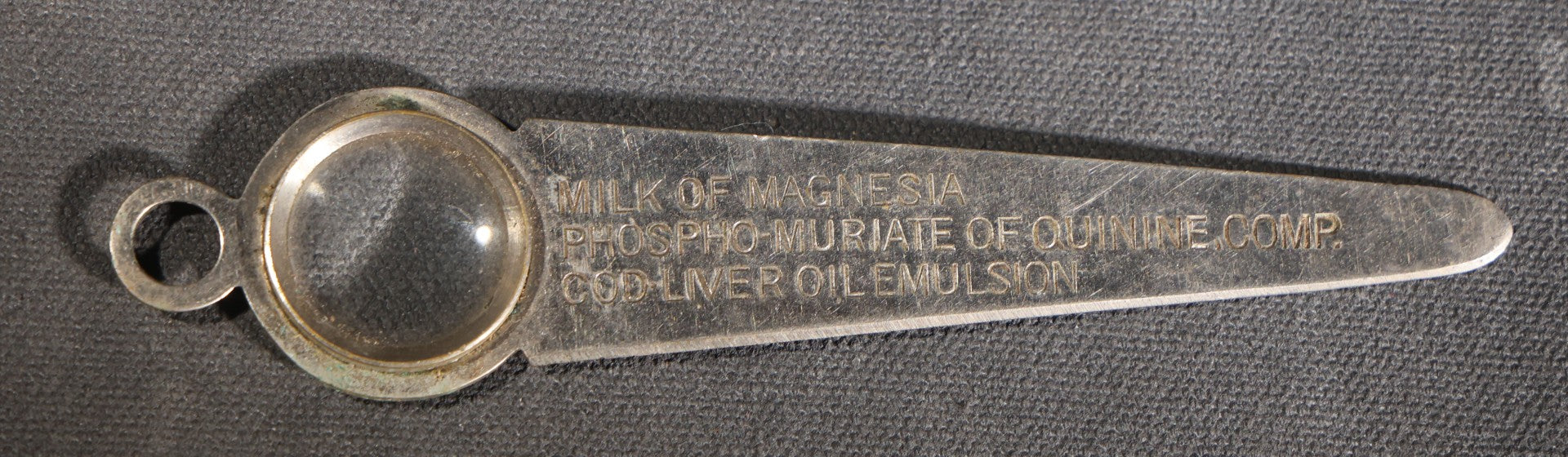 Lot 083 - Antique Phillips' Milk Of Magnesia Advertising Magnifying Glass With Phospho-Muriate Of Quinine And Cod-Liver Oil Emulsion
