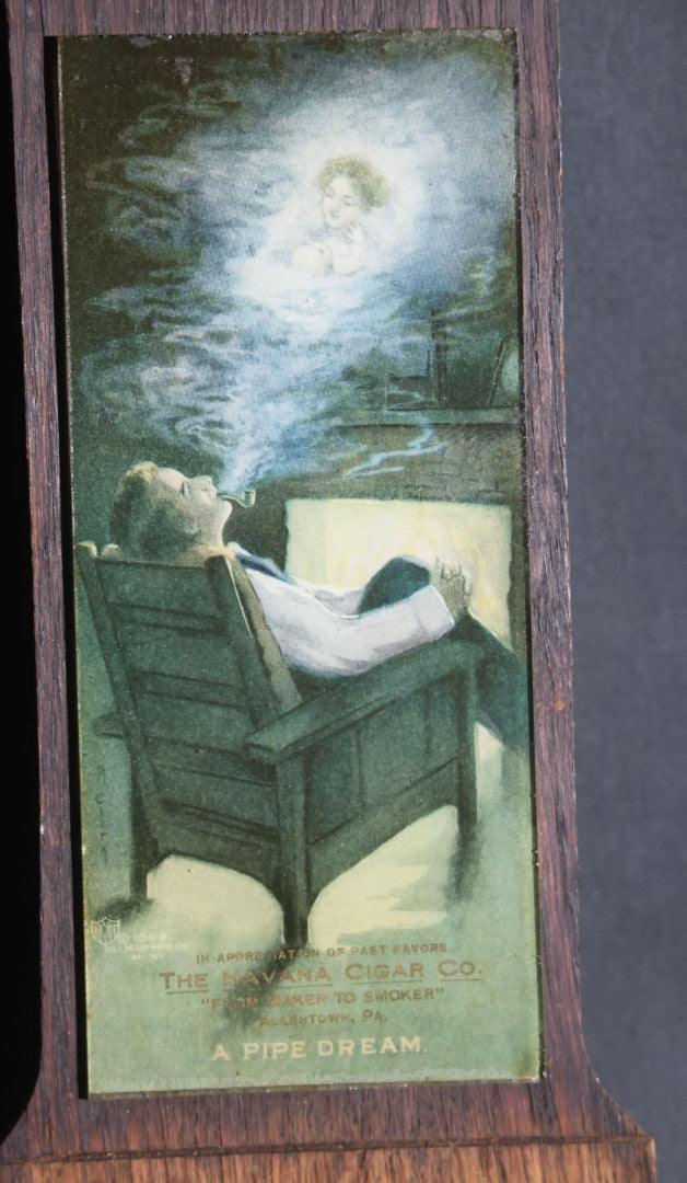 Lot 084 - Antique The Havana Cigar Co. "A Pipe Dream" Advertising Calendar Holder, "From Maker To Smoker," Allentown, Pennsylvania, Ullman Mfg. Co. Print In Oak Wall Frame With Clock Face, Copyright 1909