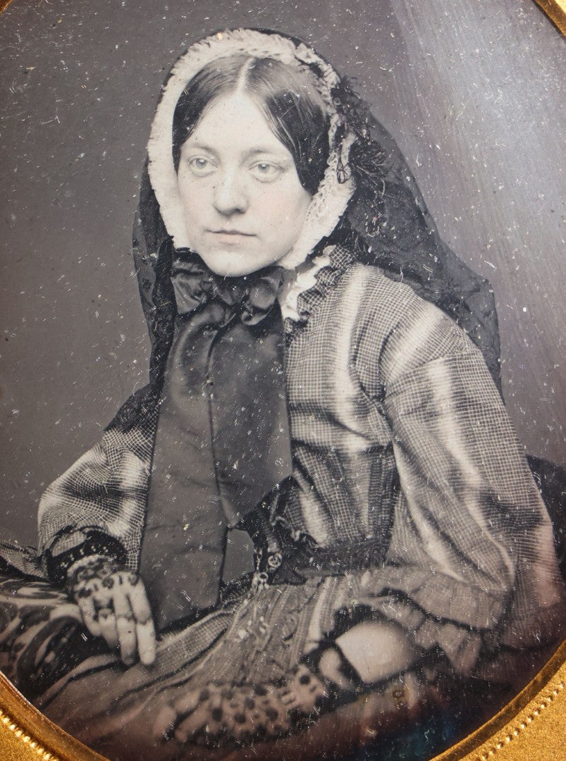 Lot 110 - Antique 1/6th Plate Daguerreotype Photograph, Half Leatherette Union Case, Young Woman In Checked Dress With Lace Head Covering And Drop Earrings