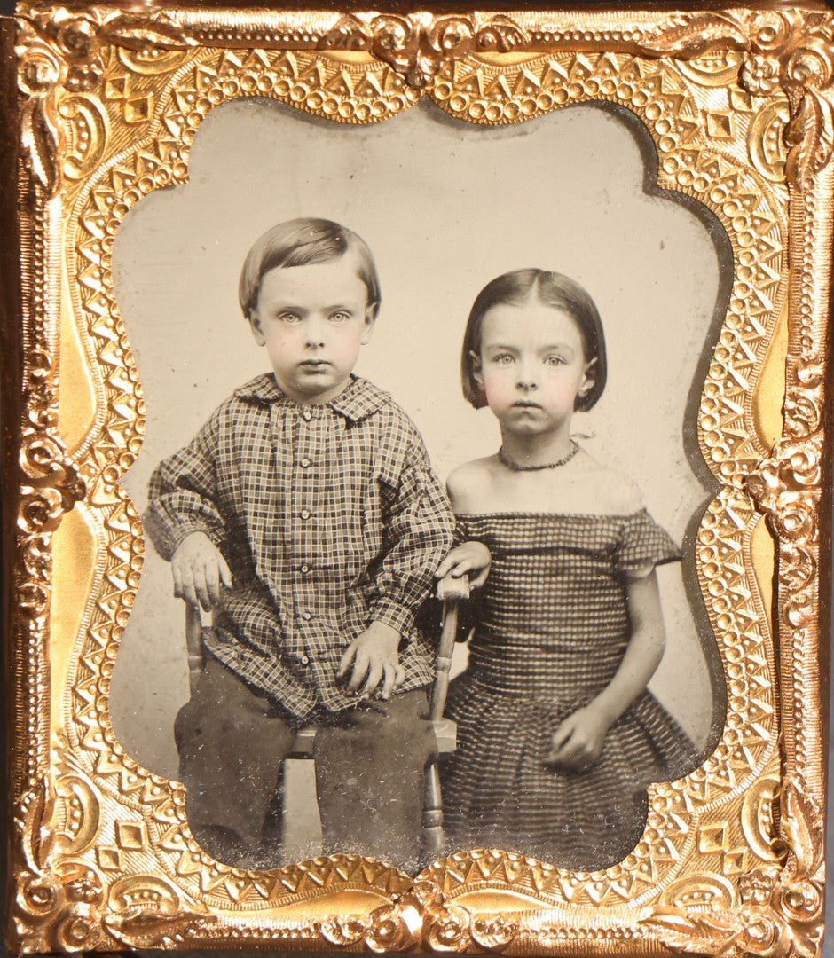 Lot 116 - Trio Of Antique Uncased Photograph Portraits Of Children, 1/6th Plate Ambrotype Of Siblings, 1/9th Plate Tintype Of A Seated Young Girl, And 1/6th Plate Ruby Ambrotype Of A Standing Young Girl, Ornate Brass Mats