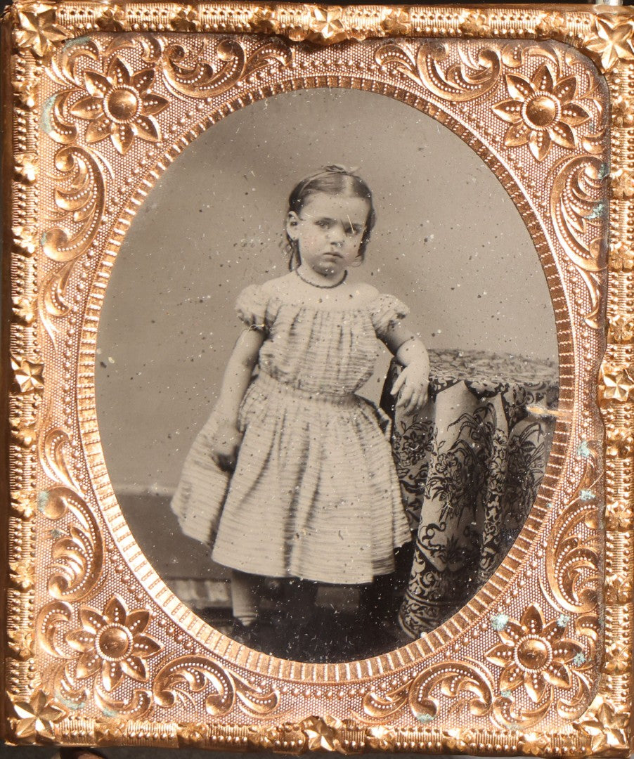 Lot 116 - Trio Of Antique Uncased Photograph Portraits Of Children, 1/6th Plate Ambrotype Of Siblings, 1/9th Plate Tintype Of A Seated Young Girl, And 1/6th Plate Ruby Ambrotype Of A Standing Young Girl, Ornate Brass Mats
