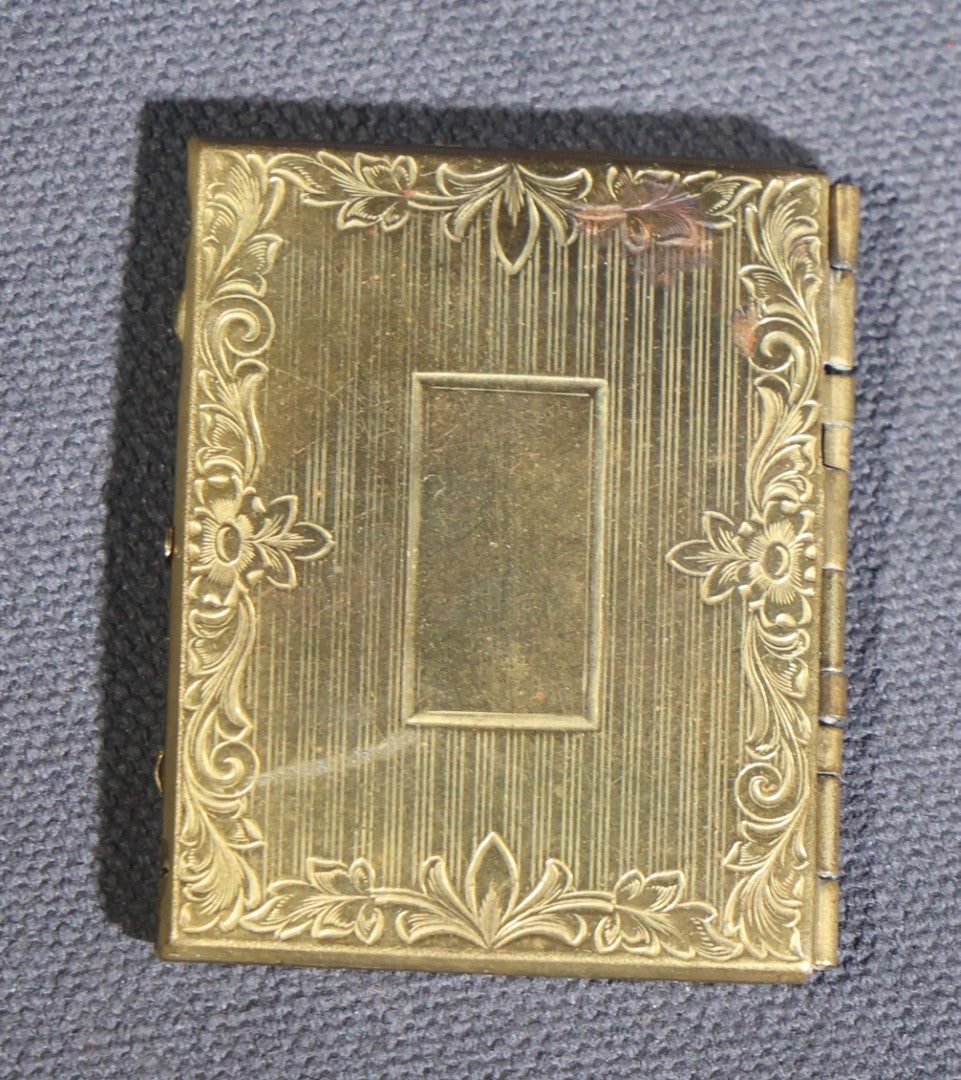 Lot 119 - Antique Tintype Photograph In Brass Book-Form Locket Case, Elderly Woman In Dark Dress, Engraved Floral And Scroll Design