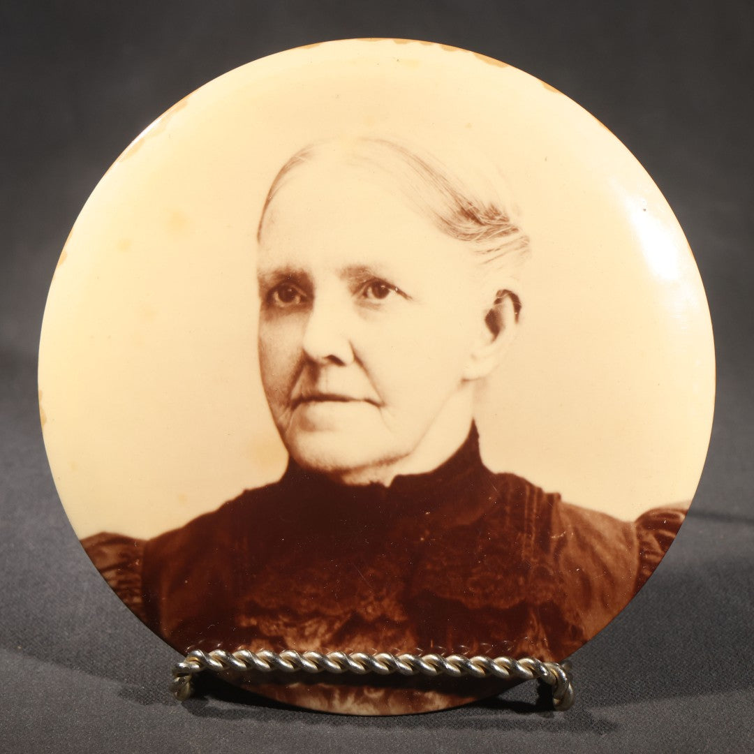 Lot 122 - Pair Of Antique Celluloid Photographic Portrait Buttons, Elderly Woman On Round Button With Tin Back And Married Couple On Rectangular Button With Velvet Back