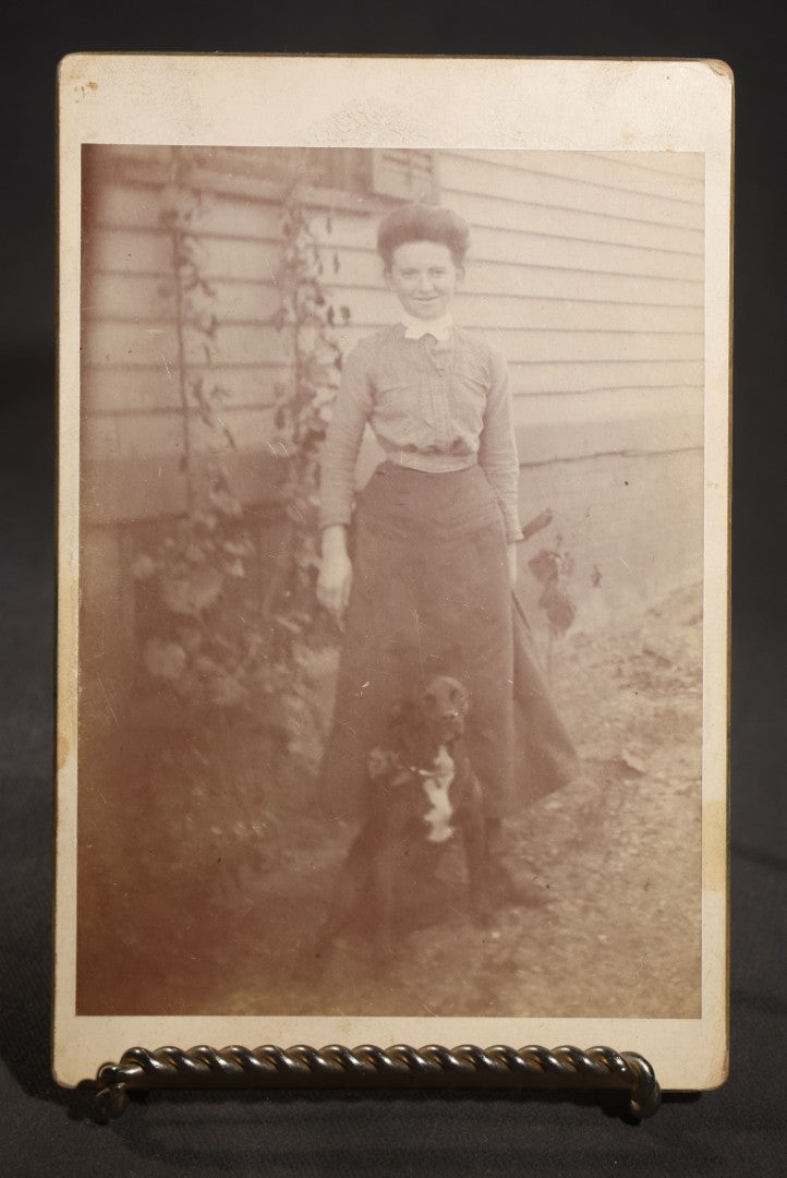 Lot 129 - Pair Of Antique Cabinet Card Photographs With Dogs, Young Woman With Black And White Dog Beside A Clapboard House And Two Children With A Collie On A Porch