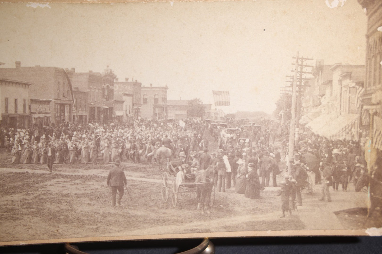 Lot 131 - Antique Board-Mounted Panoramic Photograph Of A Parade On Main Street, Storm Lake, Iowa, Photographed By Coman, Crowds, Horseback Rider, And American Flag