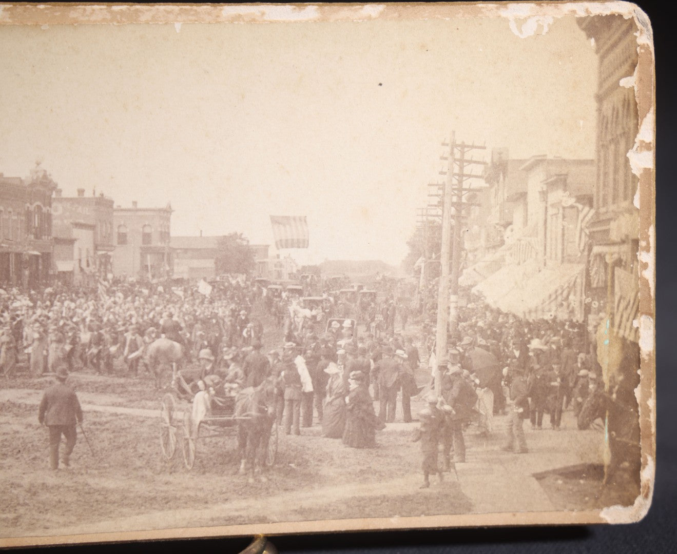 Lot 131 - Antique Board-Mounted Panoramic Photograph Of A Parade On Main Street, Storm Lake, Iowa, Photographed By Coman, Crowds, Horseback Rider, And American Flag