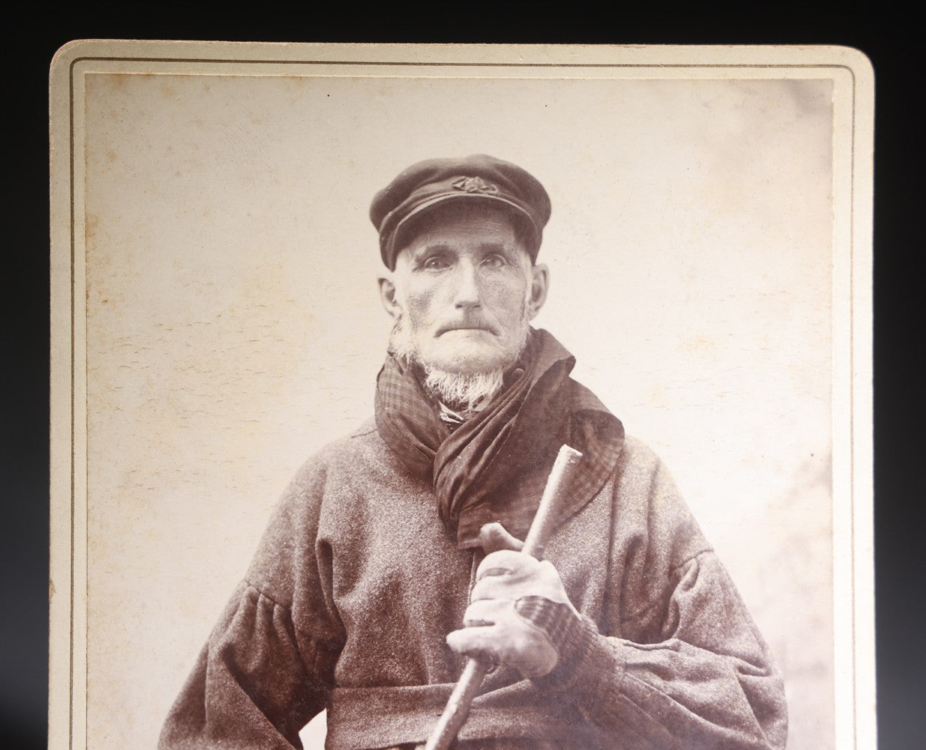 Lot 134 - Antique Cabinet Card Photograph Of A Rugged New England Man In Heavy Coat, Cap, Gloves, And Scarf Holding A Walking Stick, Ink-Inscribed "Joel Simons," Photographed By Bullock, Northfield, Vermont
