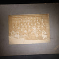 Lot 139 - Antique Board-Mounted Photograph Of Japanese Children In Kimono With Their Teacher, One Child Picking His Nose, Photographed By N. Ohashi
