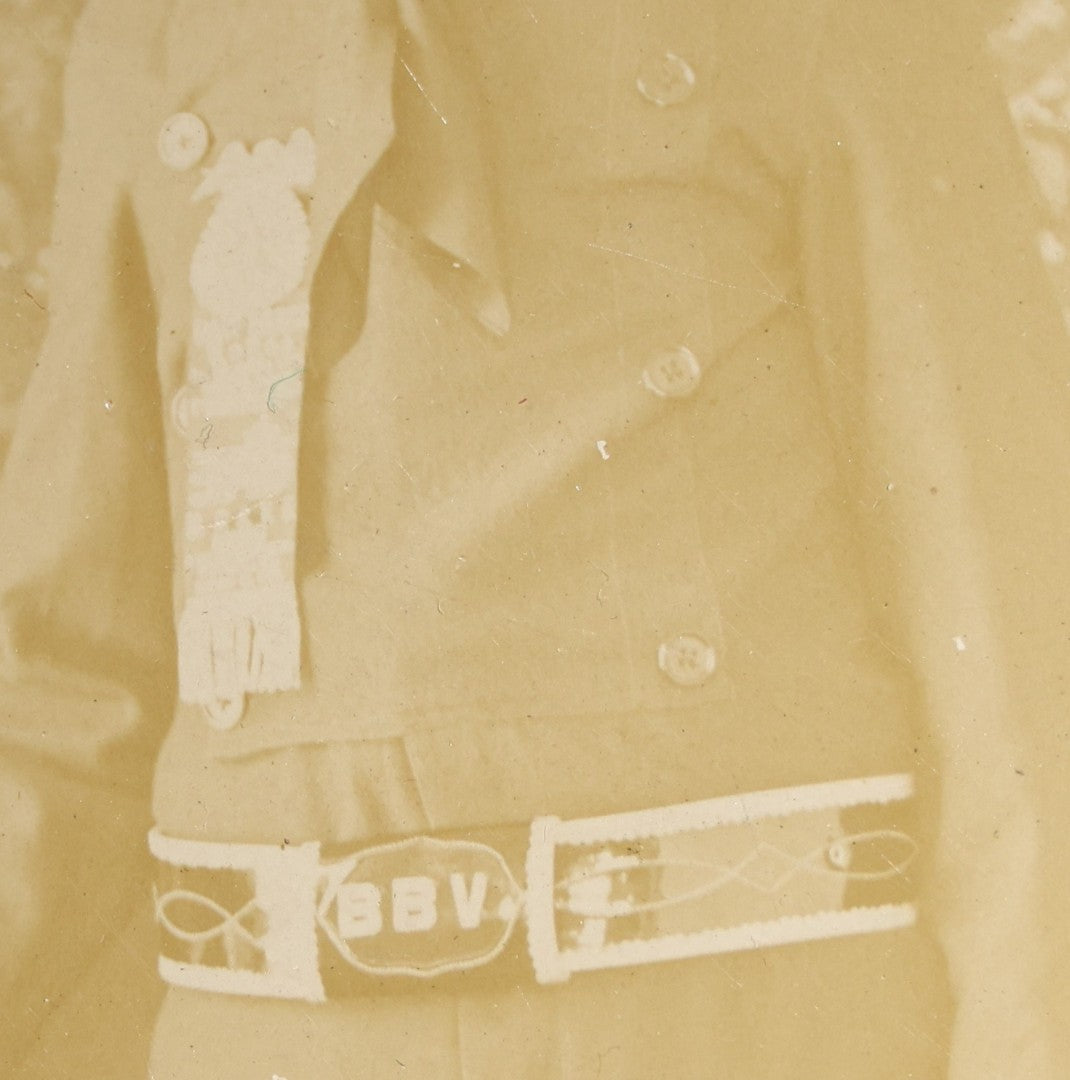 Lot 143 - Antique Board-Mounted Photograph Of A Man In Western Dress With Cowboy Hat, Decorative Shirt, And Fraternal Ribbon Badge With Eagle Device, "Bbv" Belt Buckle