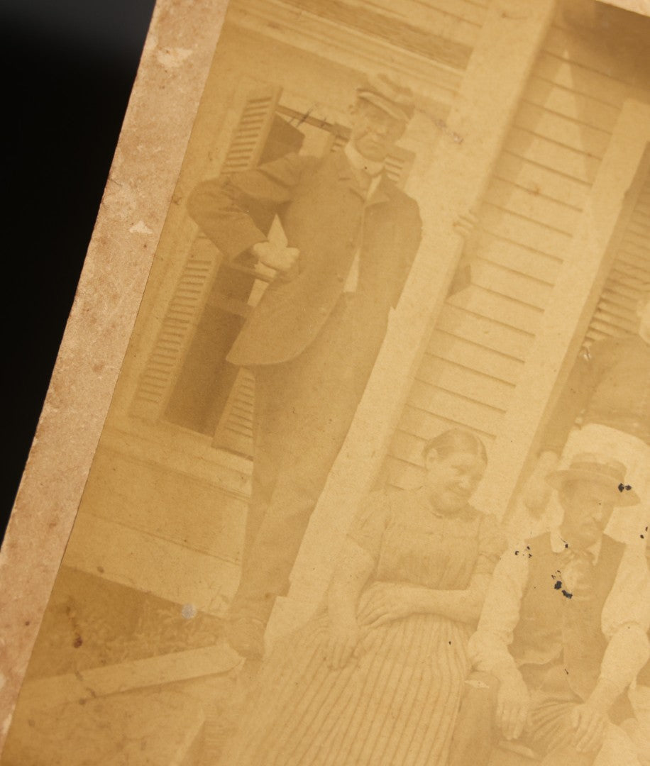 Lot 145 - Grouping Of Six Antique Board-Mounted Photographs Of Large Outdoor Group Gatherings, Including Ox Cart Scene With African American Woman, Porch Group With African American Domestic Staff, And Multi-Generational Assembly Before Farmstead