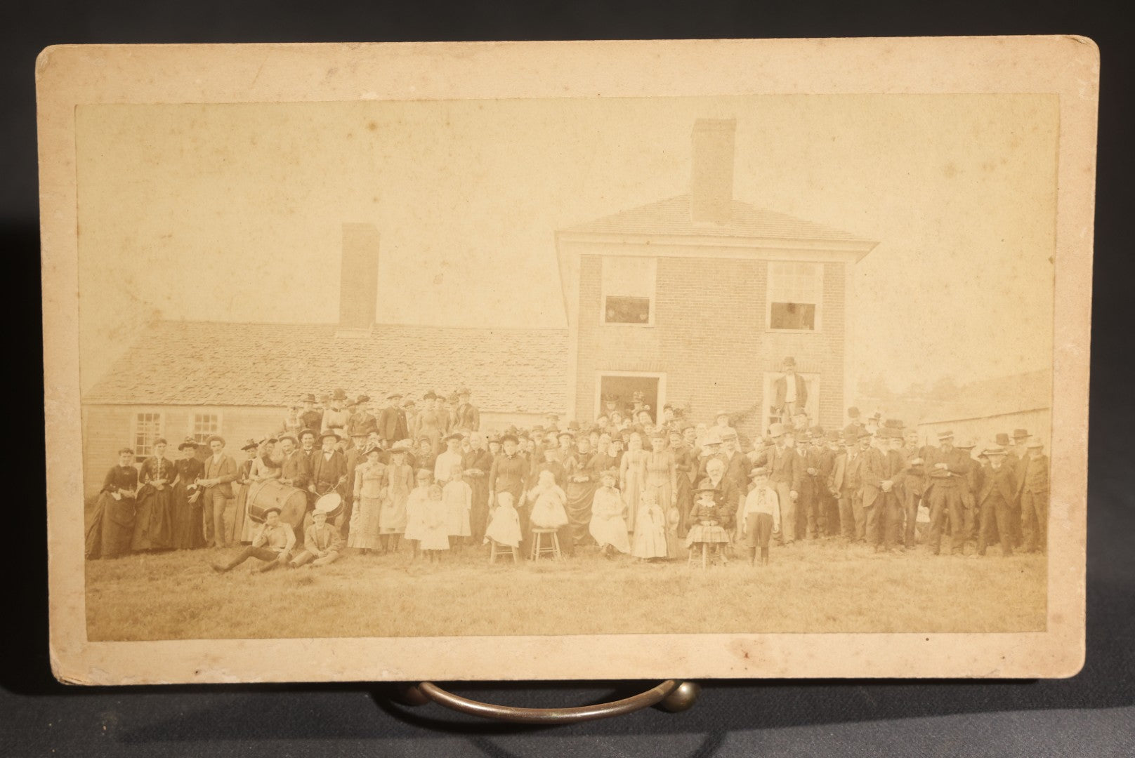 Lot 145 - Grouping Of Six Antique Board-Mounted Photographs Of Large Outdoor Group Gatherings, Including Ox Cart Scene With African American Woman, Porch Group With African American Domestic Staff, And Multi-Generational Assembly Before Farmstead
