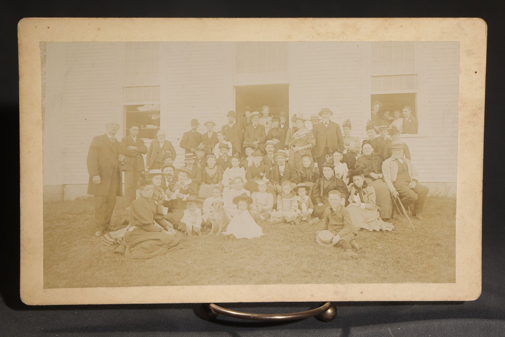 Lot 145 - Grouping Of Six Antique Board-Mounted Photographs Of Large Outdoor Group Gatherings, Including Ox Cart Scene With African American Woman, Porch Group With African American Domestic Staff, And Multi-Generational Assembly Before Farmstead