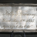 Lot 006 - Antique Silver-Tone Casket Plaque, Engraved "Nellie T. Devaney, Died May 6th 1885," Aged 1 Year, 6 Months, 6 Days, 5-1/8" W x 3" H