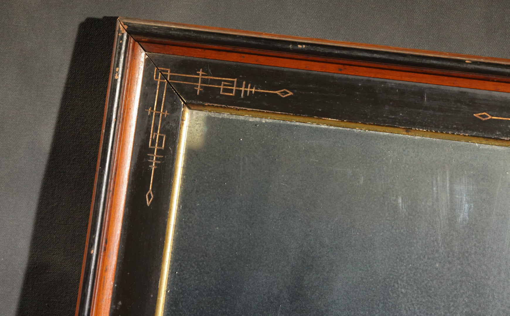 Antique Eastlake-Style Ebonized and Walnut Framed Mirror with Gilt Incised Geometric Decoration, Replacement Mirror Plate