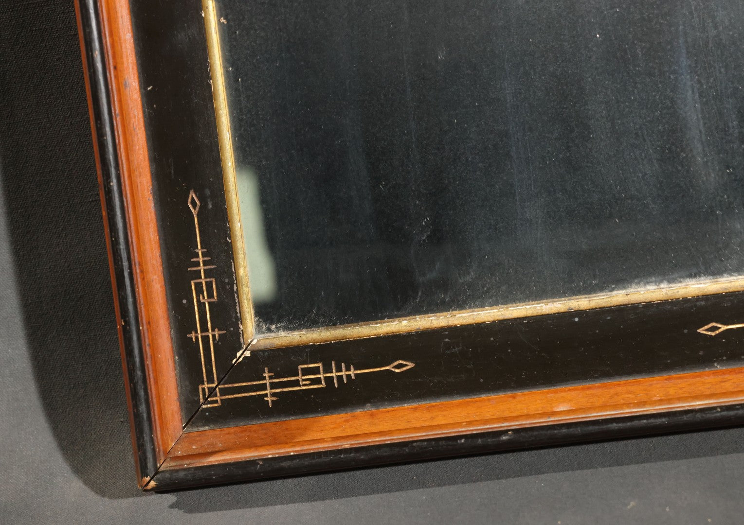 Antique Eastlake-Style Ebonized and Walnut Framed Mirror with Gilt Incised Geometric Decoration, Replacement Mirror Plate