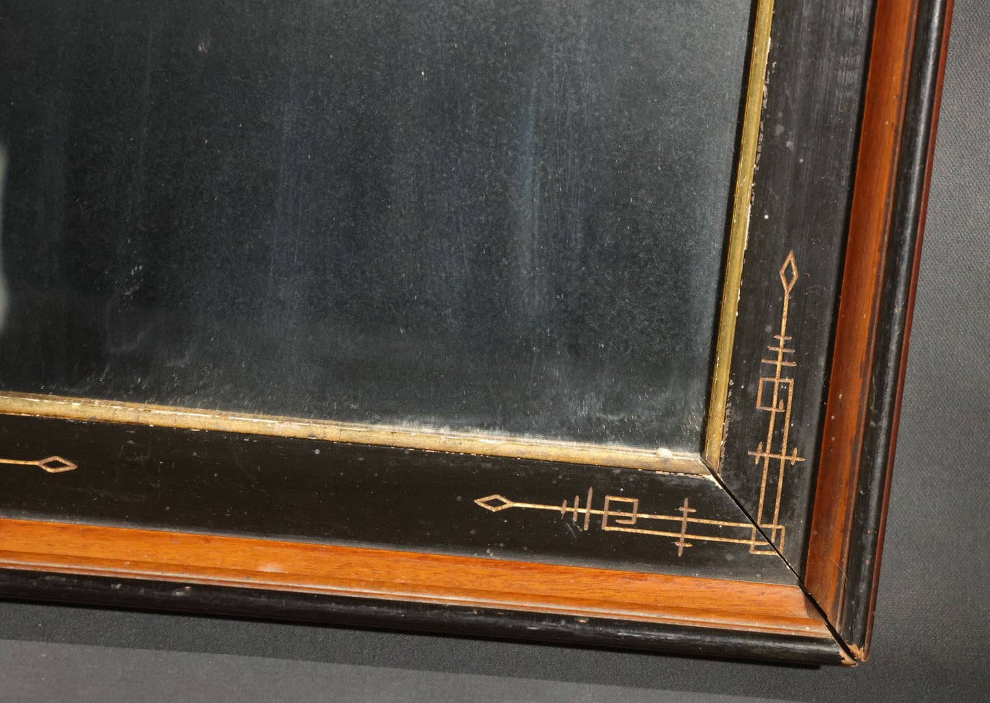 Antique Eastlake-Style Ebonized and Walnut Framed Mirror with Gilt Incised Geometric Decoration, Replacement Mirror Plate