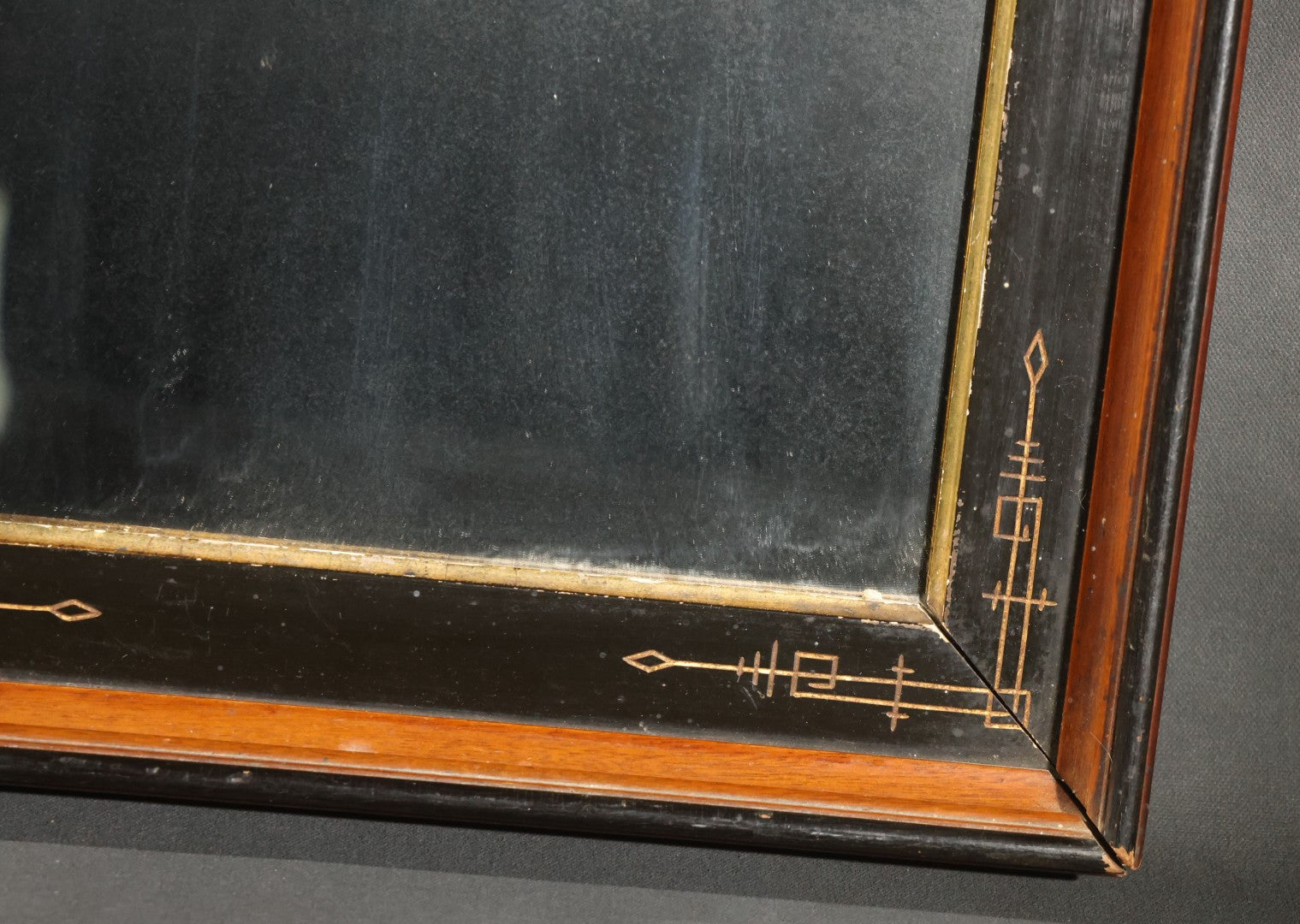 Antique Eastlake-Style Ebonized and Walnut Framed Mirror with Gilt Incised Geometric Decoration, Replacement Mirror Plate