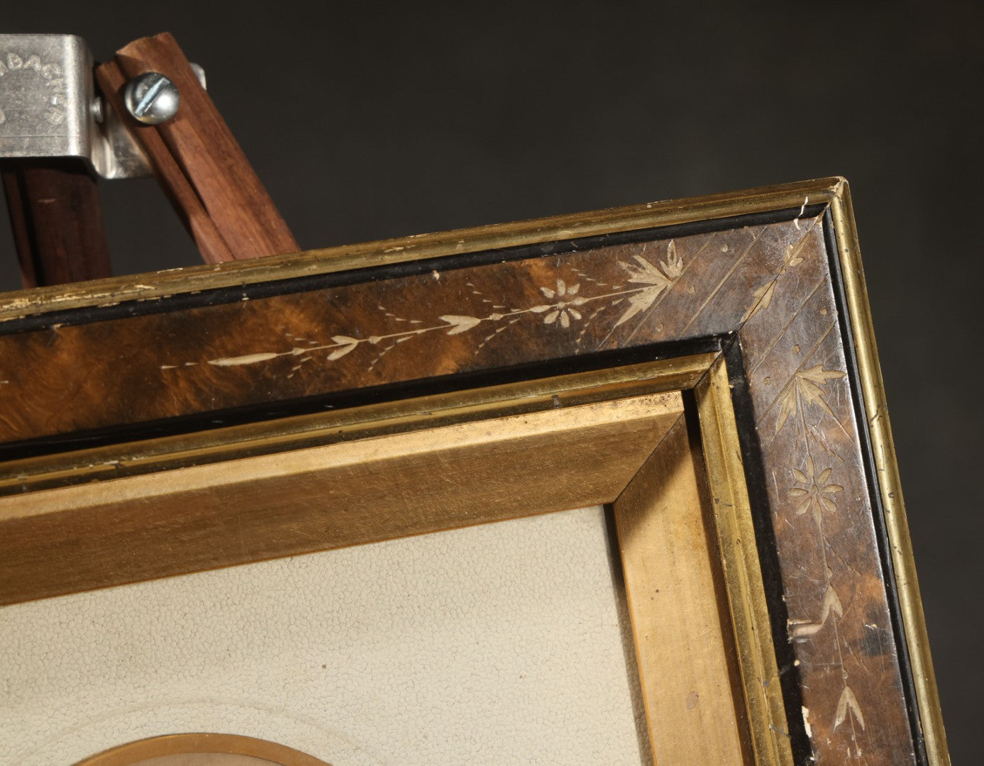 Antique Photograph of a Young Girl in a White Dress, Matted with Oval Gilt Opening, in Ebonized Inlaid Frame
