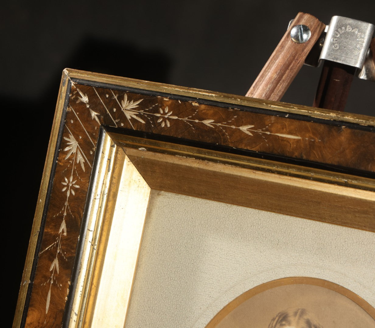 Antique Photograph of a Young Girl in a White Dress, Matted with Oval Gilt Opening, in Ebonized Inlaid Frame