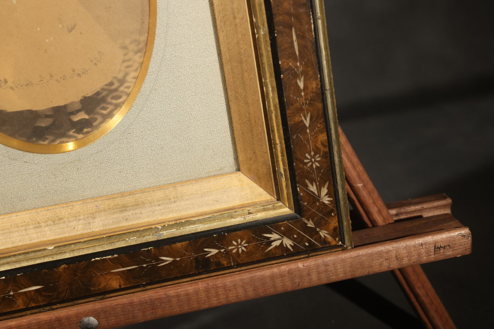Antique Photograph of a Young Girl in a White Dress, Matted with Oval Gilt Opening, in Ebonized Inlaid Frame