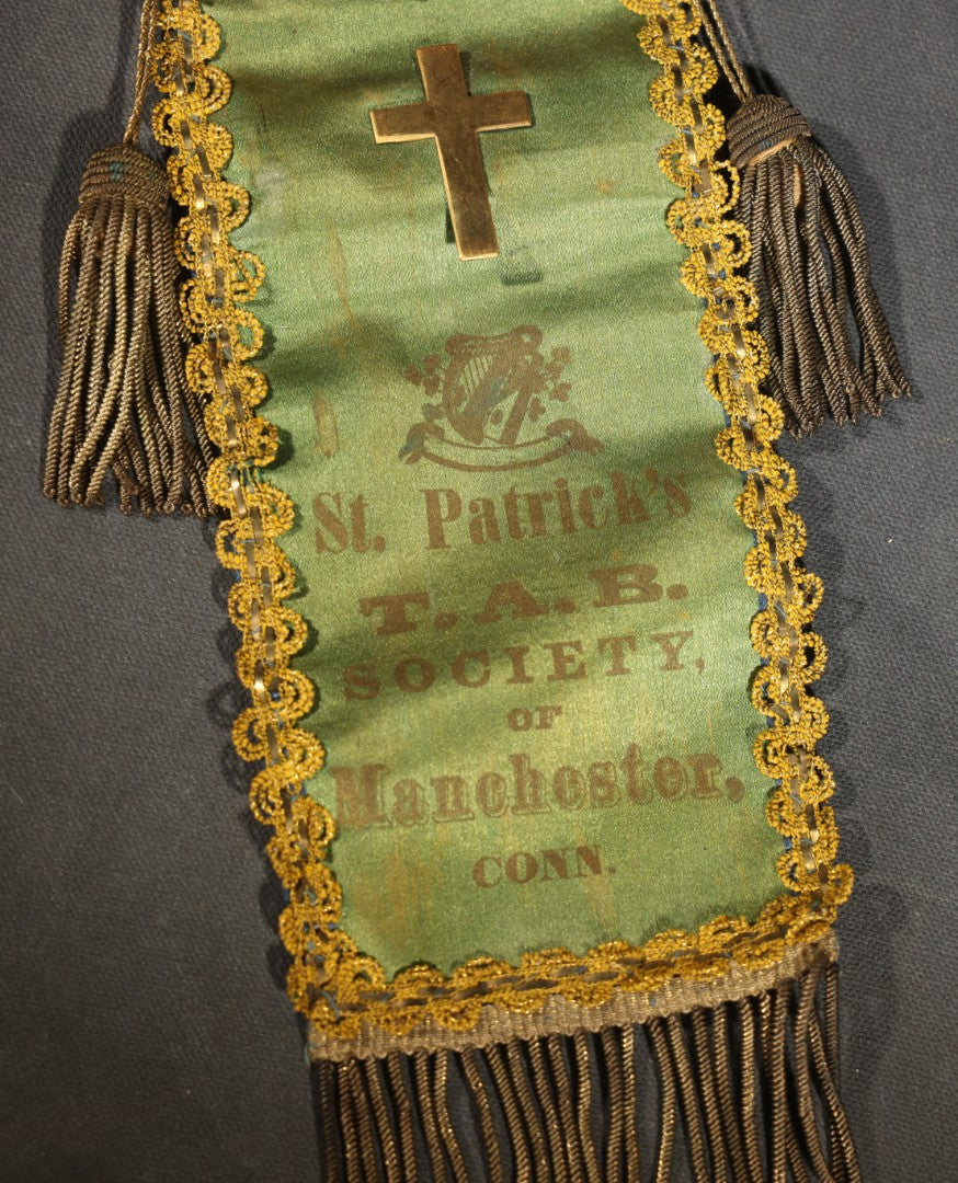 Antique Fraternal Ribbon Badge and Rosette, St. Patrick's T.A.B. Society of Manchester, Connecticut, Green Silk with Applied Brass Cross, Gold Braid Trim, and Jeweled Rosette