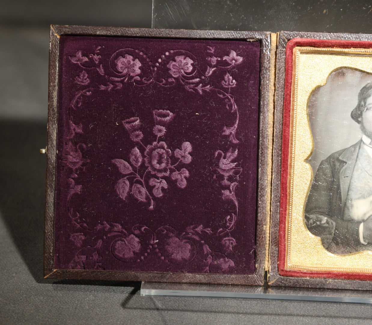 Antique 1/6th Plate Daguerreotype Photograph of a Young Man Hugging His Dog, in Full Leatherette Union Case with Figural Woman and Scrollwork Cover