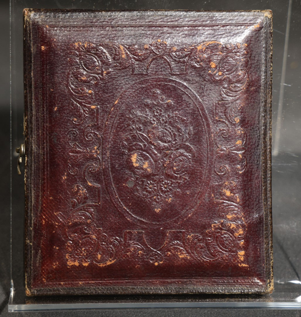 Antique 1/6th Plate Daguerreotype Photograph of a Young Man Hugging His Dog, in Full Leatherette Union Case with Figural Woman and Scrollwork Cover