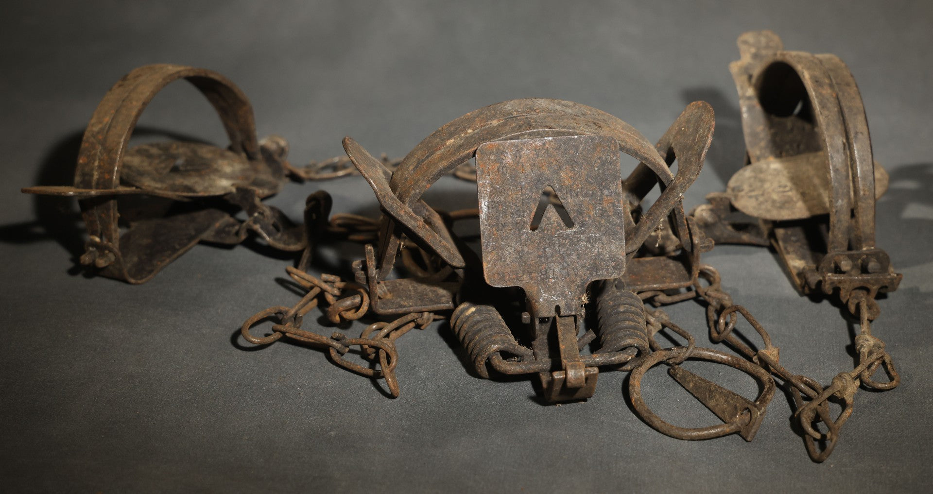 Trio of Vintage Iron Animal Traps Including Victor and Kangaroo No. 1-1/2 Examples, Heavy Surface Rust Throughout