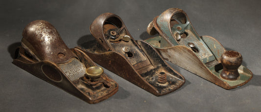 Trio of Vintage and Antique Stanley and Unbranded Metal Block Planes Including Stanley No. 220, Stanley Patent 2-18-13, and Made in U.S.A. Example